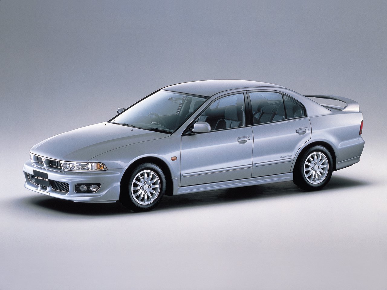 Mitsubishi модели. Mitsubishi Aspire, 1998. Mitsubishi Aspire 2002. Митсубиси аспире 1998. Автомобили Mitsubishi Aspire 1998 – 2003 седан.